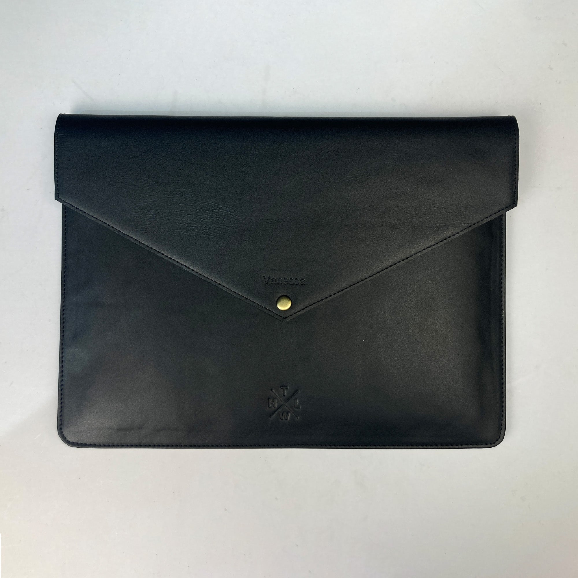 Black leather envelope on a white background