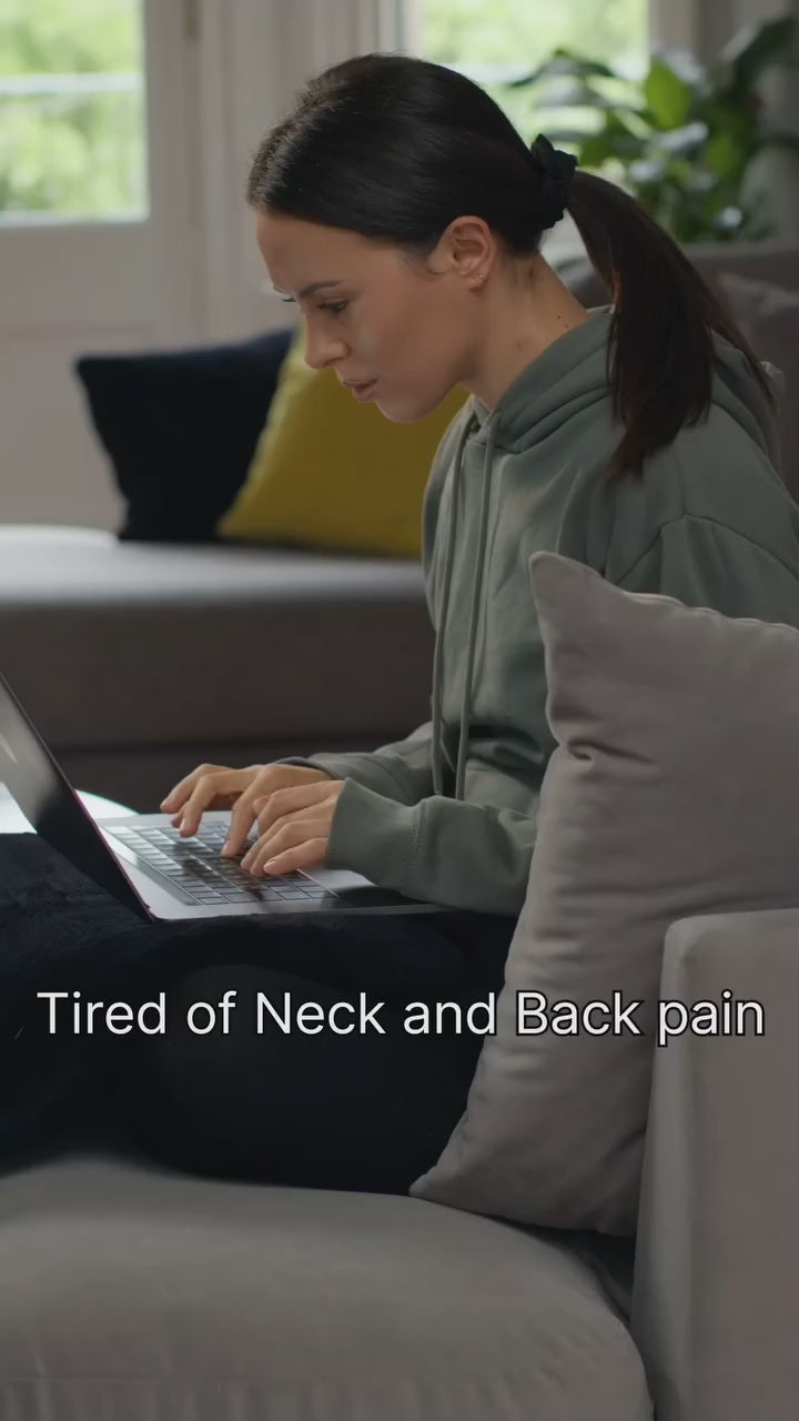 A woman uses a standy. laptop sleeve black. 