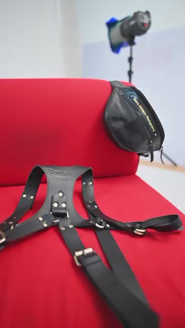 showcase black leather camera strap and waist bag. 